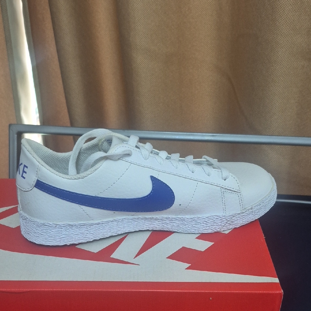 Nike Men's White Sneakers with Blue Swoosh